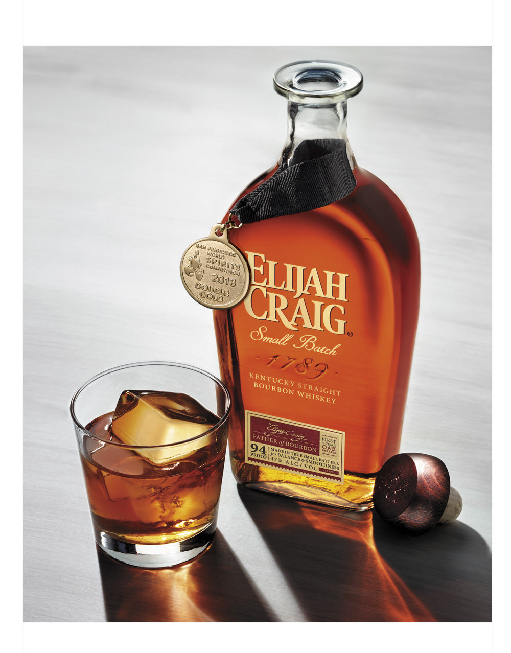 Elijah Craig Small Batch Bourbon Whiskey bottle and glass